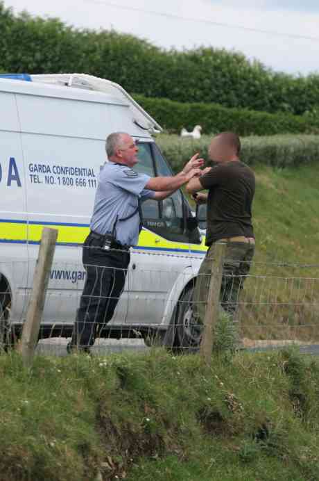 Gill tangling with protester in June 2009