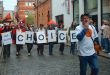 Alan (right) leading a small pro-choice march in 2002 Alan (right) leading a small pro-choice march in 2002